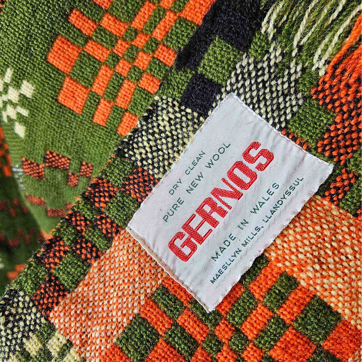 Vintage Welsh blanket in green, orange, cream