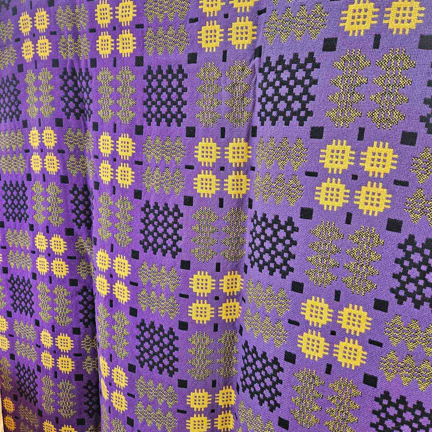 Vintage Welsh blanket in purple, yellow, and black