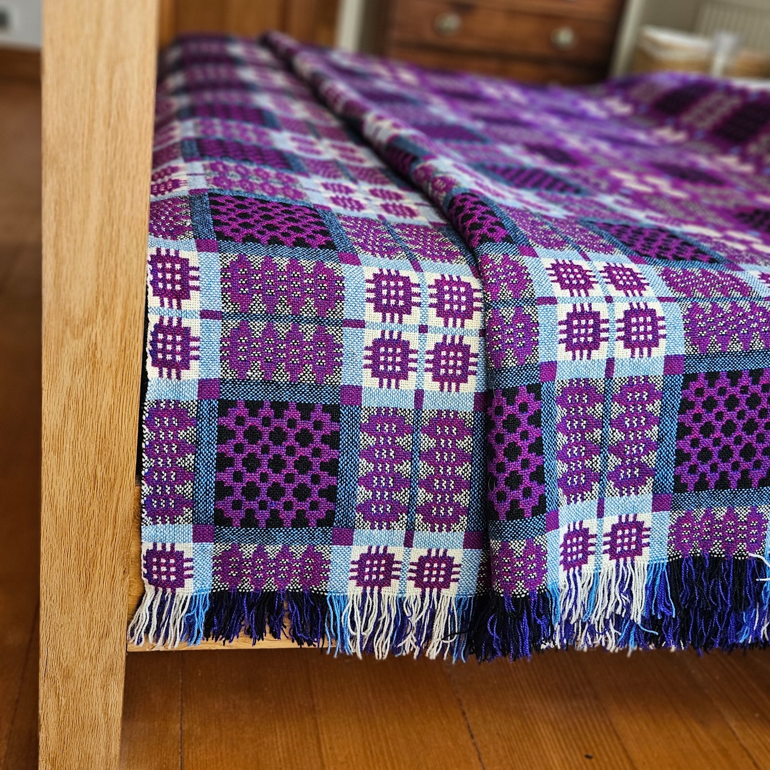 Vintage Welsh blanket in purple, aqua, black, cream